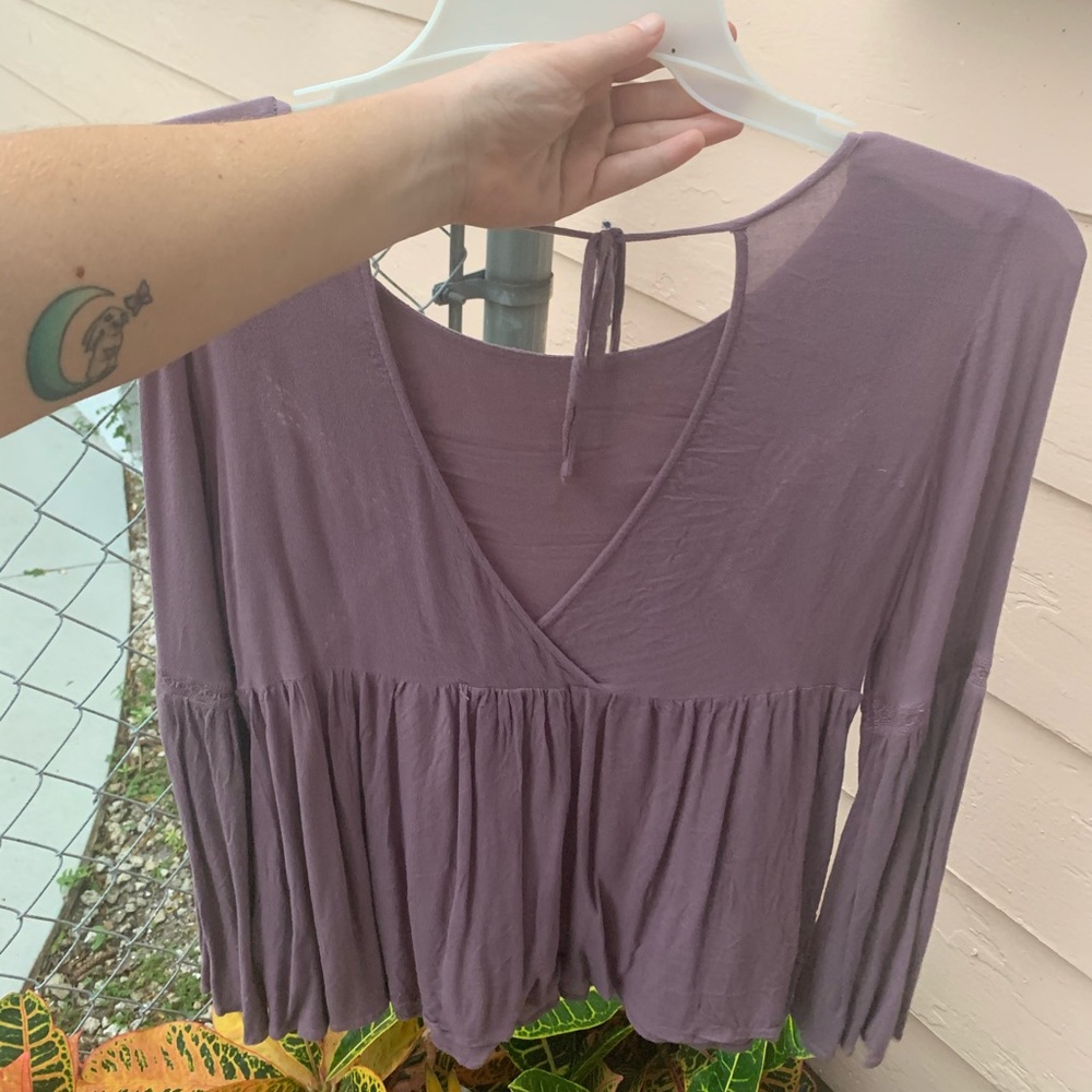 Purple bell sleeve flare top